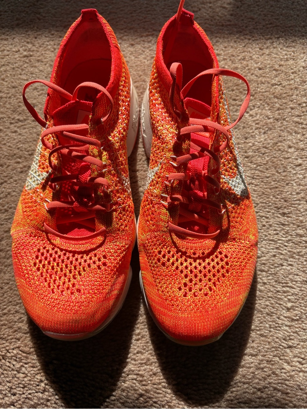 Nike Women's Flyknit Running Sneakers - Bright Orange with White Swoosh